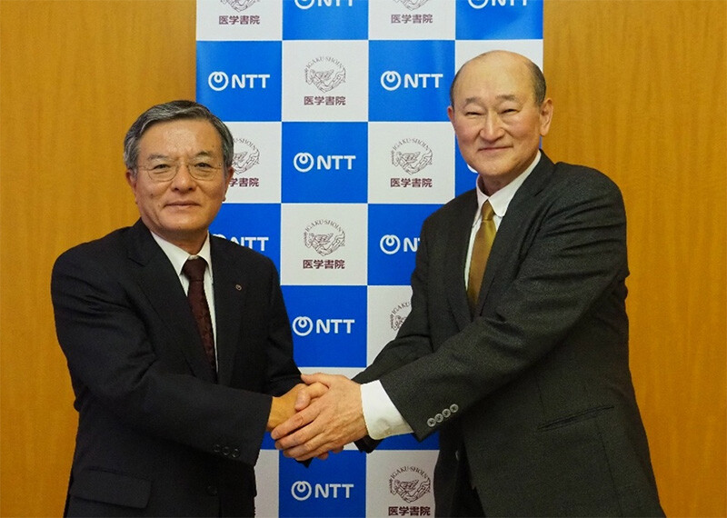 NTT 島田明社長（左）と医学書院 金原俊社長（右）